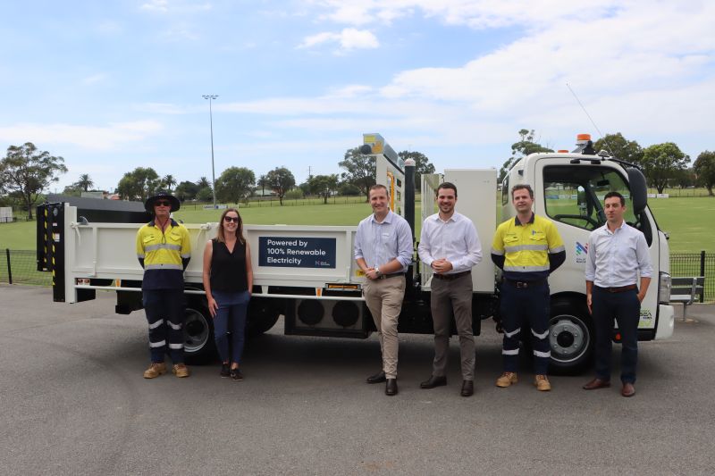 : (L-R) City of Newcastle Senior Field Worker Andrew Parkinson, City of Newcastle Manager Community Strategy & Innovation Ashlee Abbott, Cr Callum Pull, Deputy Lord Mayor Declan Clausen, City of Newcastle Fleet Coordinator Ian Lorenz and City of Newcastle Sustainability Manager Steele Adams with the new electric truck.