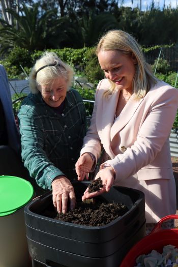 Hunter Multicultural Communities’ Garden Coordinator Margaret Kenning and Newcastle Lord Mayor Nuatali Nelmes inspect the worm farm