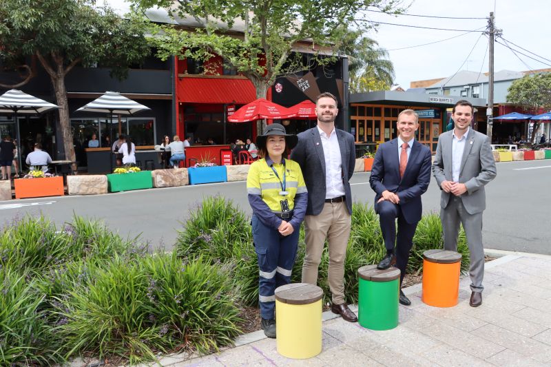 City of Newcastle Project Manager Bianca Field-Vo, Greater Newcastle City Commissioner Matt Endacott, New South Wales Minister for Infrastructure Rob Stokes and Newcastle Deputy Lord Mayor Declan Clausen take a look at some of the exciting changes implemented as part of the Streets as Shared Space trial on Darby Street.