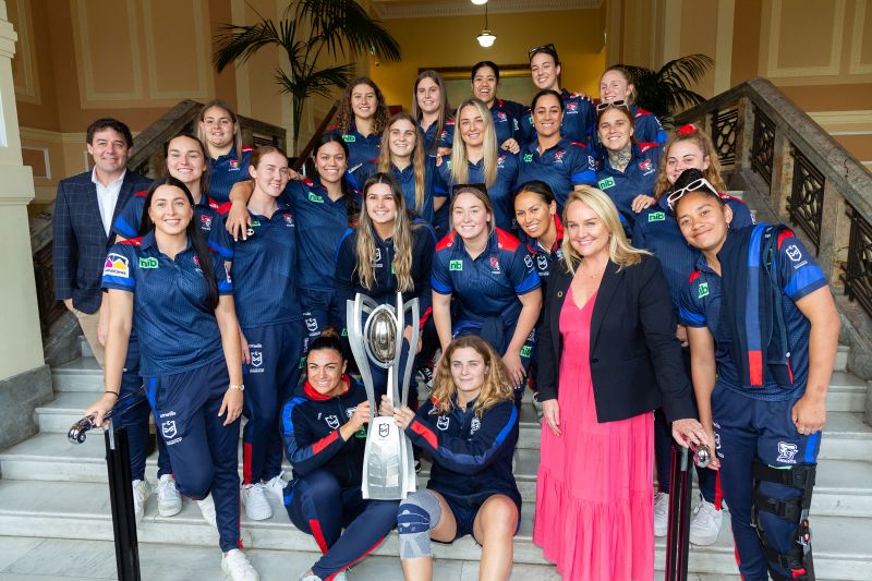 Newcastle Lord Mayor Nuatali Nelmes celebrates the Newcastle Knights’ historic 2022 NRLW Premiership win with the team on the steps of City Hall.