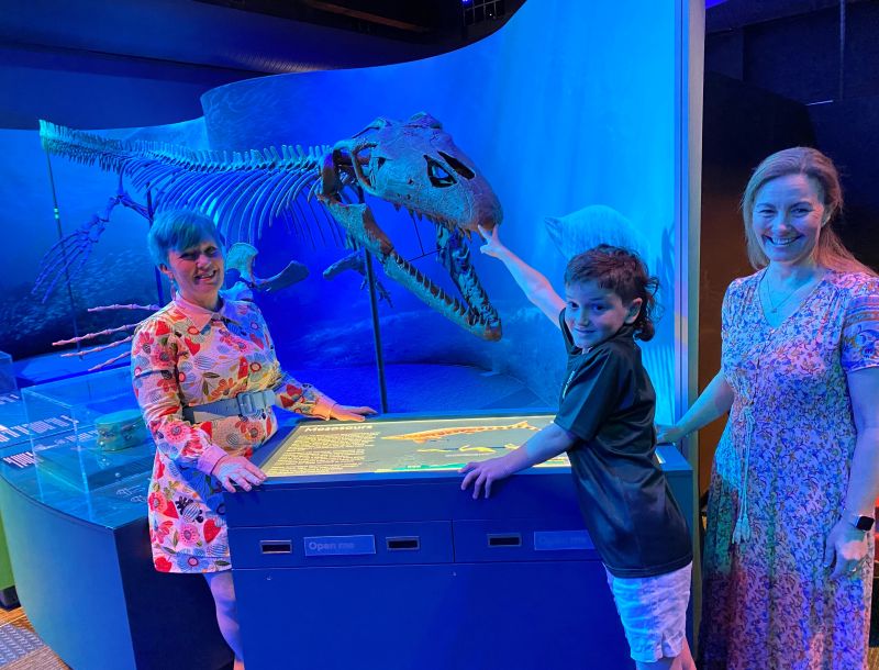 Newcastle Museum Director Julie Baird with Councillor Peta Winney-Baartz and her son Finnan Baartz, 10, explore the amazing exhibits on display at the Sea Monsters exhibition.
