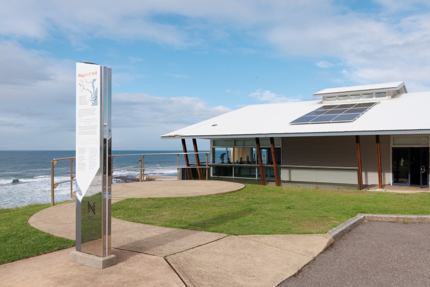External view of Fort Scratchley Function Centre, showcasing the grounds and ocean view.