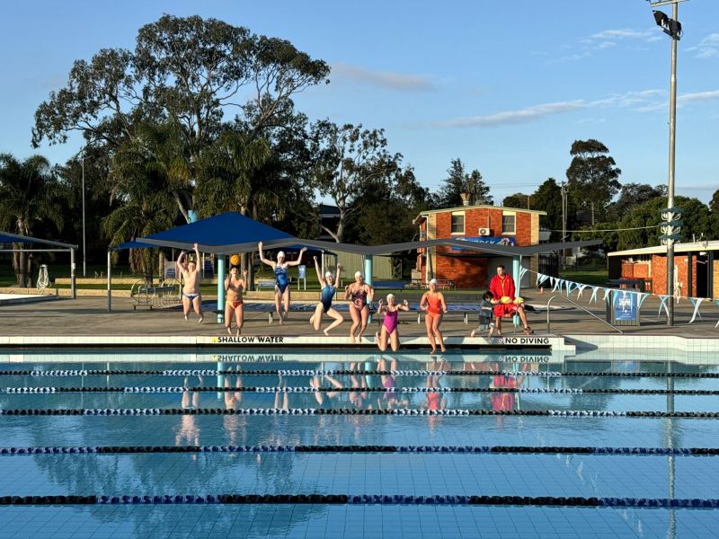 Community members jumping into Lambton pool