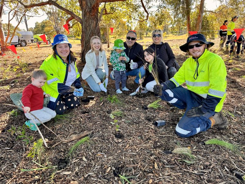 Cr Deahnna Richardson and Cr Elizabeth Adamczyk with City of Newcastle staff and local community members at the Թվ Tree Day planting at Tarro Reserve today.