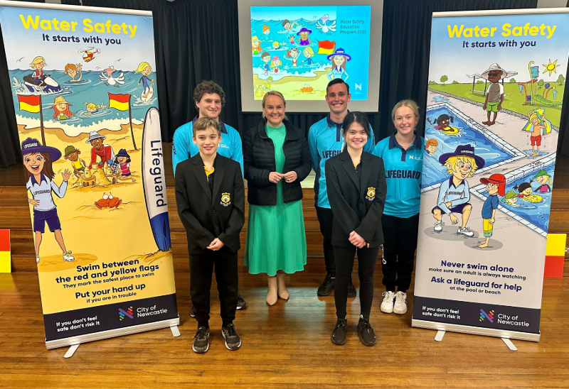 Lord Mayor Nuatali Nelmes joins City of Newcastle lifeguards Julian Boag, Dan Collins and Lily Forbes, and vice captains Rocky Stevenson and Vienna Wills at Jesmond Public School for a Water Safety Education session.