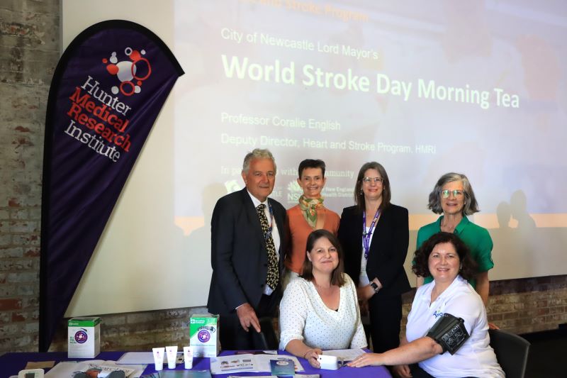 Image Caption: Lord Mayor Ross Kerridge, i-REBOUND program developer Meredith Burke, Professor Coralie English and Kim Beesley stand behind as Professor Beata Bajorek checks stroke survivor and advocate Emma Beesleys blood pressure. This was a free service facilitated for all community members at today's event.